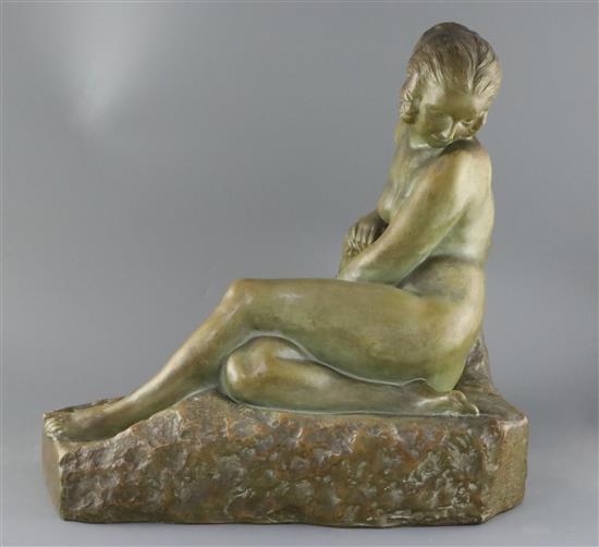 Marcel Bouraine (1886-1948). A French bronzed terracotta figure of a reclining woman, depth 15in. height 17in. length 17.5in.